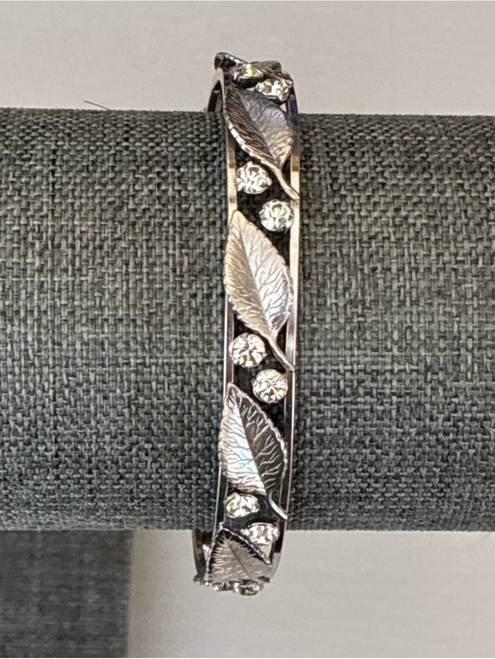 Krementz silver tone cuff with leaves and clear rhinestones 6-3/4”